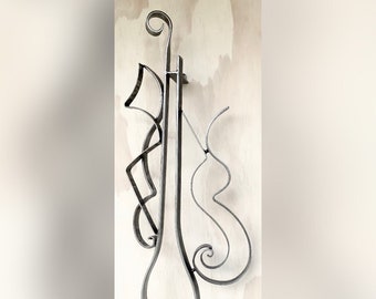 Harmony, our wall sculpture depicting an upright bass player with jazz singer in concert.