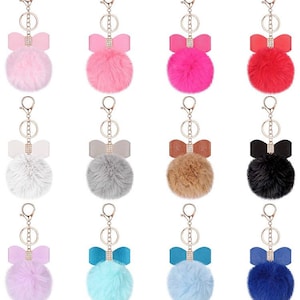 Fuzzy Fluffy pom pom with bow key chain, book bag, purse bling  FREE Shipping in the USA