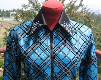 May include: A blue and black sequined show jacket with a black satin collar and silver accents. The collar has rhinestones.