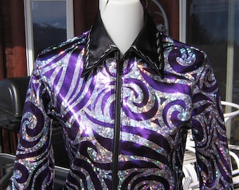 May include: A purple and silver sequined jacket with a black zipper and collar. The jacket has a swirling pattern.