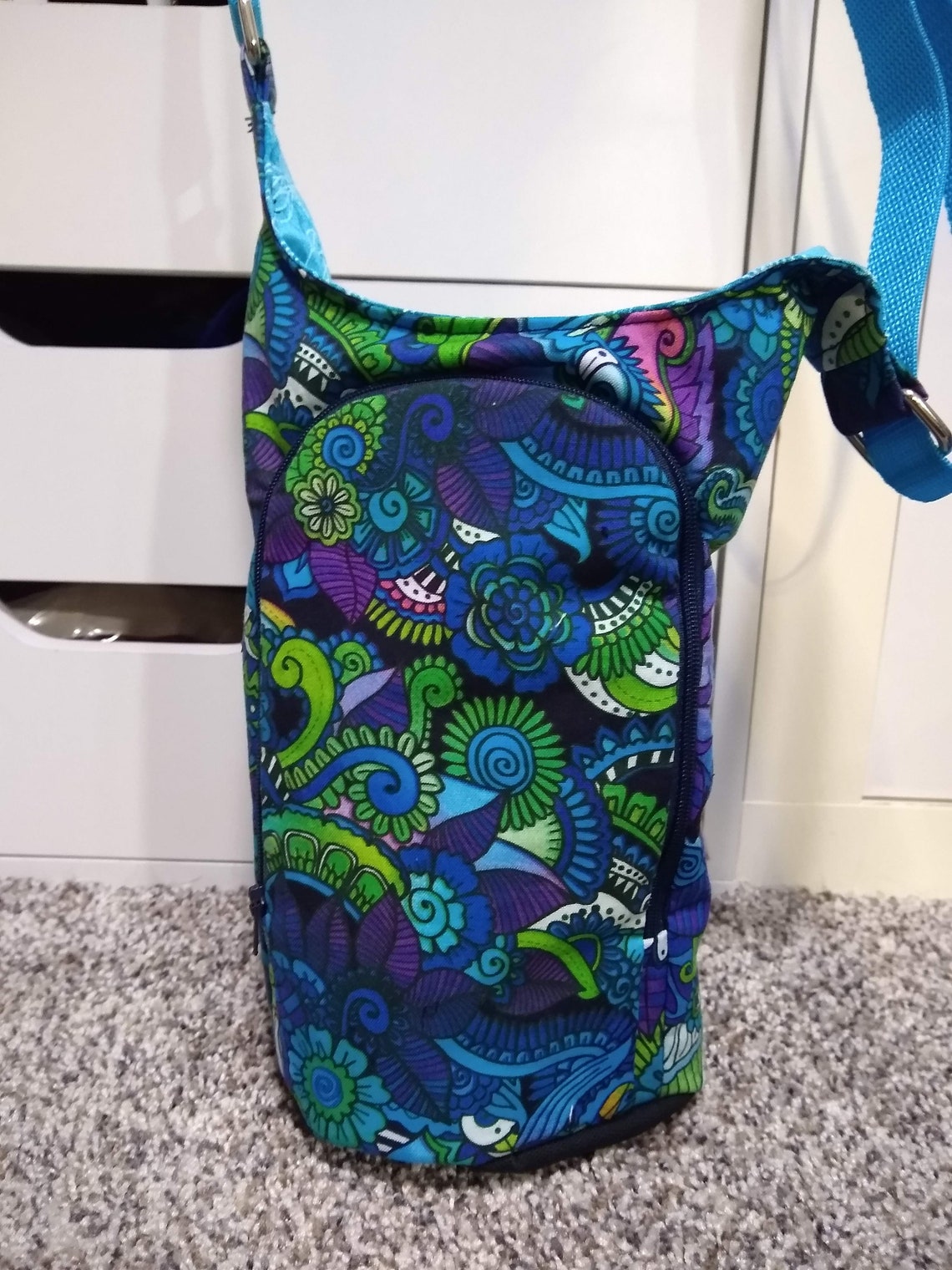 best sling bag for water bottle