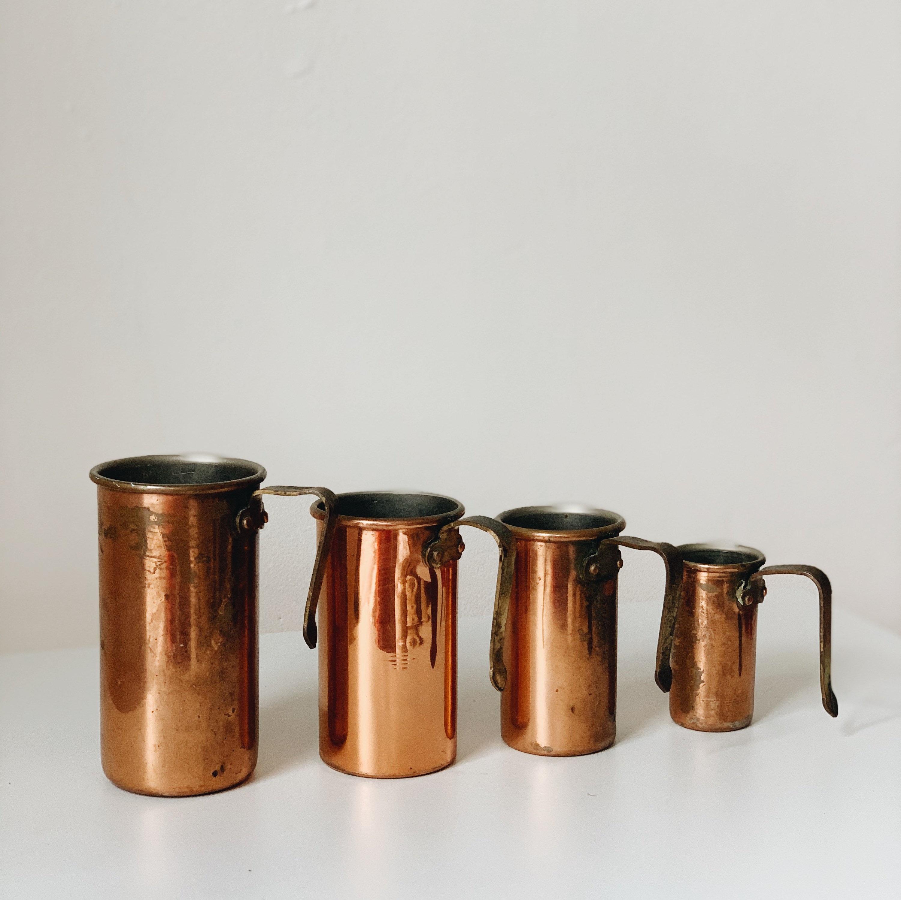 Vintage copper and brass measuring cups $29.95 #Magnoliaandwillowtw