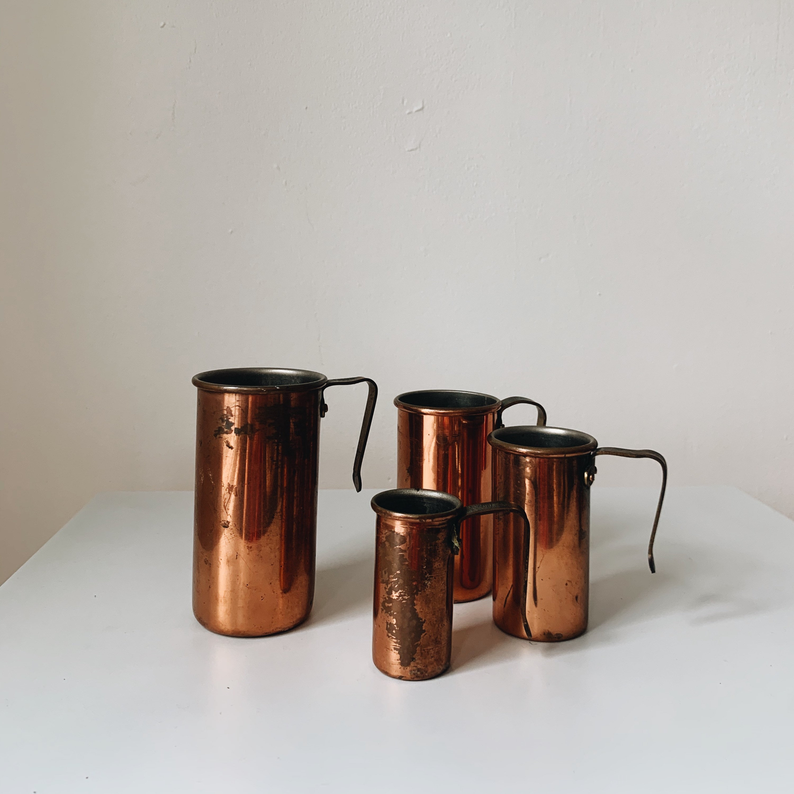 Vintage copper and brass measuring cups $29.95 #Magnoliaandwillowtw