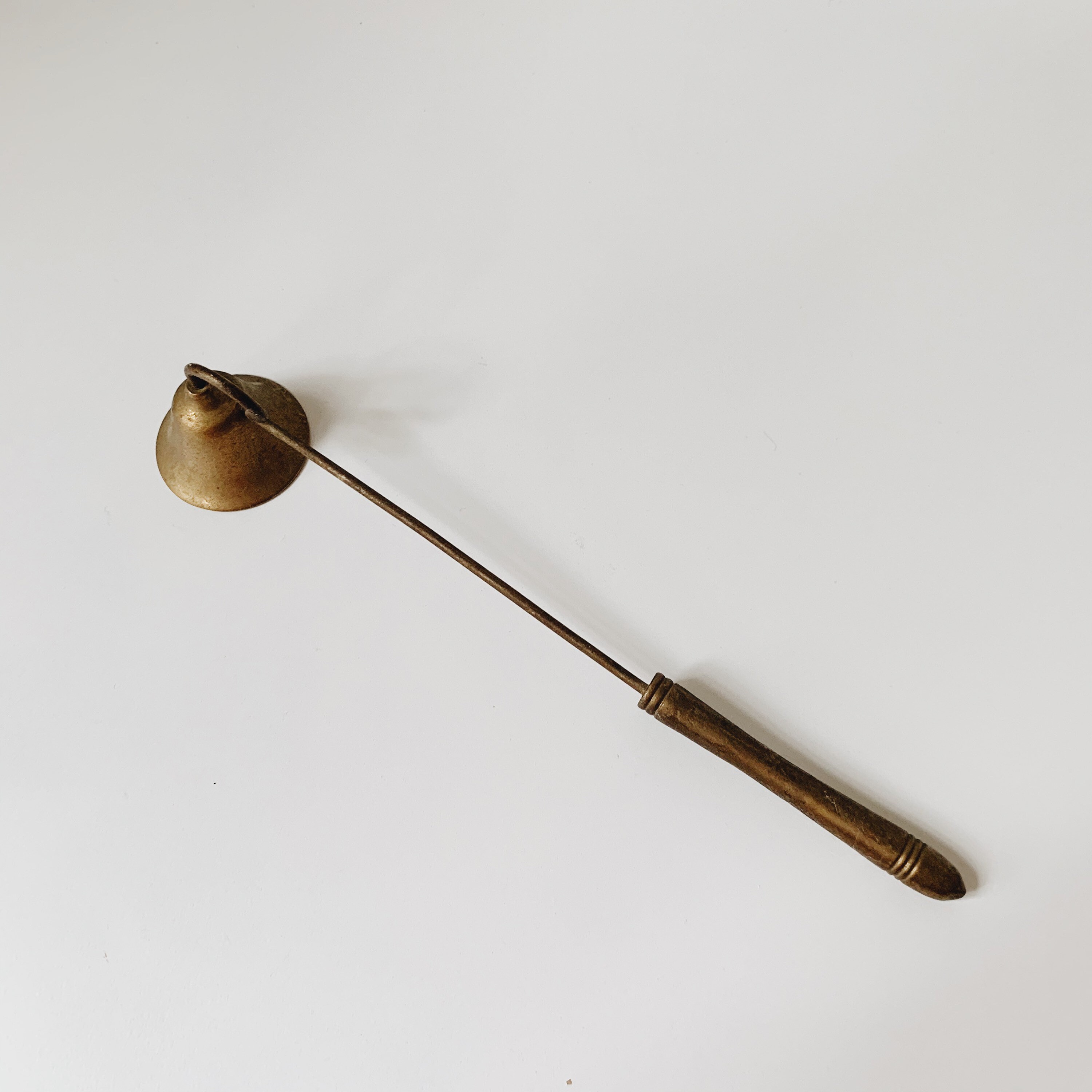 Vintage brass snuffer