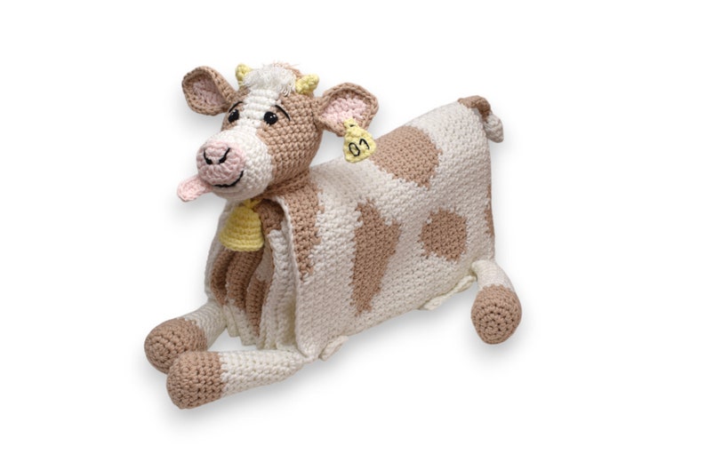 Crochet cow baby blanket that folds into crochet toy cow. PDF crochet pattern to make a cow blanket as baby shower gift. Crochet pattern to make a blanket for babies, children, teens and adults.