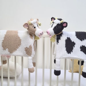 Crochet cow baby blanket that folds into crochet toy cow. PDF crochet pattern to make a cow blanket as baby shower gift. Crochet pattern to make a blanket for babies, children, teens and adults.