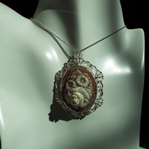 Sterling siliver pendant with a hand carved sardondyx cameo