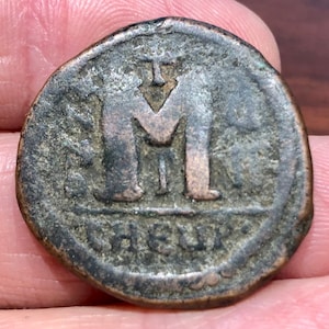 565-574 AD mad king Justin II and empress Sophia, Byzantine bronze coin. Abdicated the throne voluntarily for the well-being of the Empire