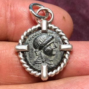 59-60 AD God of the Sun & Arts, Apollo, god of Music, Dance with Lyre (Harp) musical instrument. Ancient Roman bronze coin in silver pendant