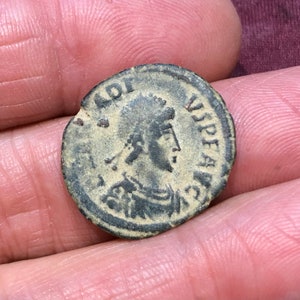 383-408 AD Arcadius, who ended paganism in the Roman Empire and prohibited its worship. Ancient Roman bronze artifact coin with Chi Rho