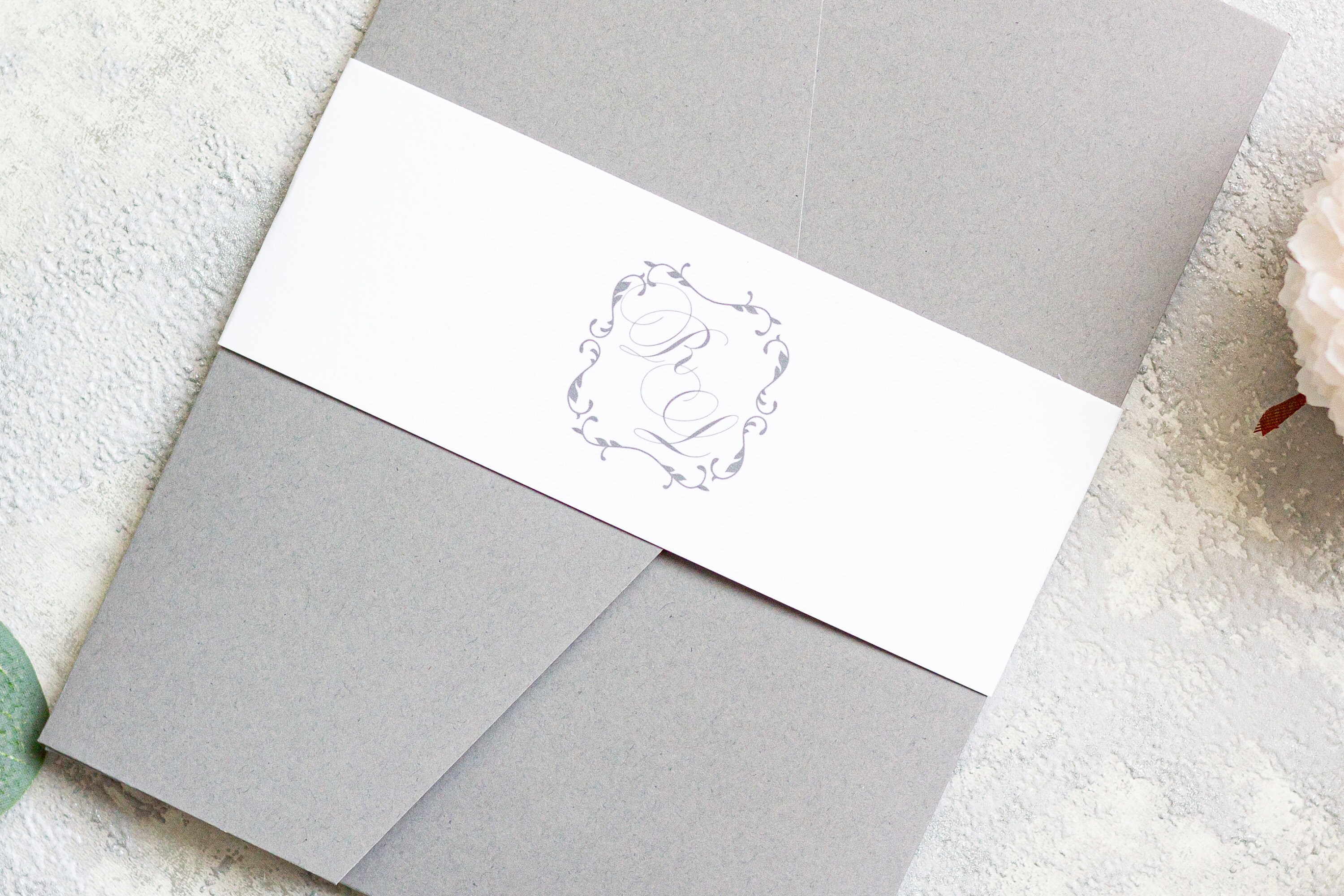 Grey pocketfold invitation with dior bow and buckle