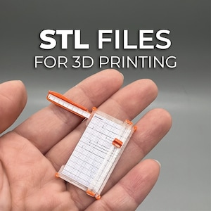STL files 1:12 scale Paper Cutter with fold out ruler and sliding knob