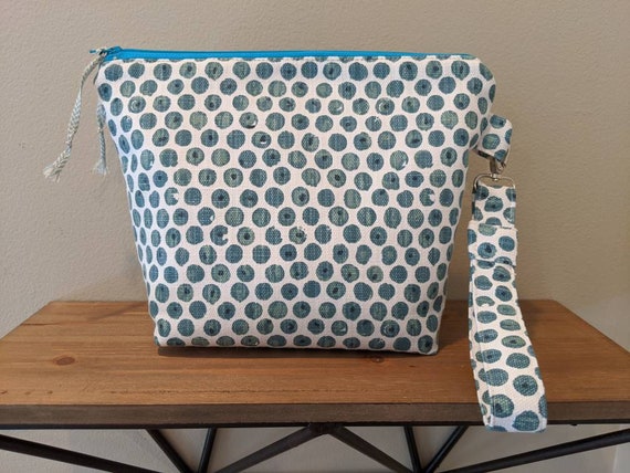 polka dot clutch bag