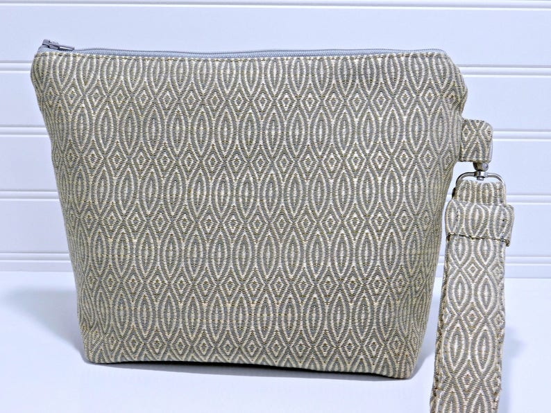 large grey clutch bag