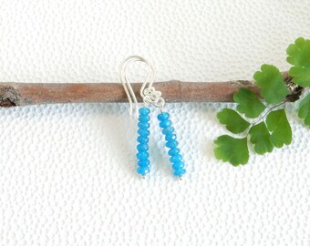 Dangling earrings with blue agate beads