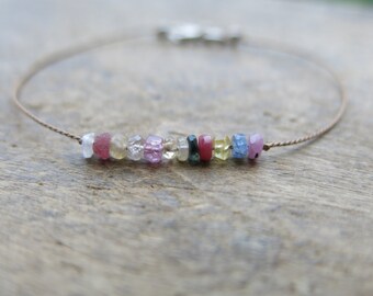 Tourmaline bracelet. Minimalist bracelet with faceted tourmaline micro rondelles on a light brown silk thread Mother's day gift.