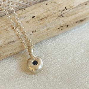 Tiny blue sapphire  necklace. on sterling silver chain,  dainty September birthstone ,