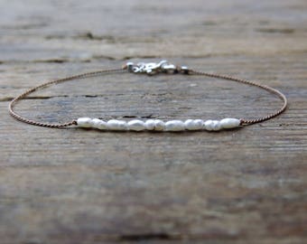 Freshwater pearl bracelet. Minimalist bracelet with freshwater micro beads brown silk thread Mother's day gift.