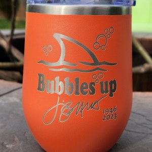 Bubbles up 12oz Beverage Tumbler. Stainless Steel. Margaritaville w/ Jimmy Buffets signature etched. Last song by Jimmy Buffett. Parrotheads
