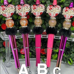 Swiftie “love” heart. You are a mirrorball pen.