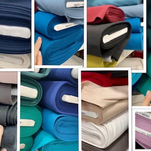 Puede incluir: Una variedad de rollos de tela en diferentes colores, incluyendo turquesa, azul, verde, rojo y gris. Los rollos de tela est&aacute;n apilados uno encima del otro.