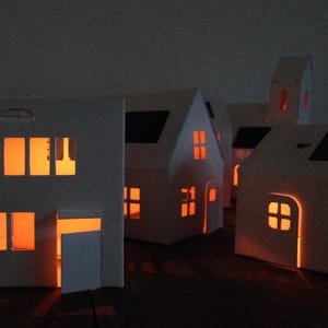 VILLAGE, Luz nocturna solar. Casagami para decorar...