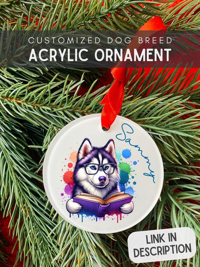 May include: A white round acrylic Christmas ornament with a colorful watercolor background. A cartoon husky dog wearing glasses is reading a book. The dog's name, "Sammy", is written in cursive on the ornament.