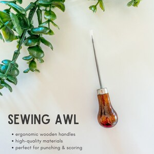 May include: A sewing awl with a polished wooden handle and a silver metal shaft. The text "SEWING AWL" is displayed, along with bullet points describing the awl's features: ergonomic wooden handles, high-quality materials, and perfect for punching & scoring.