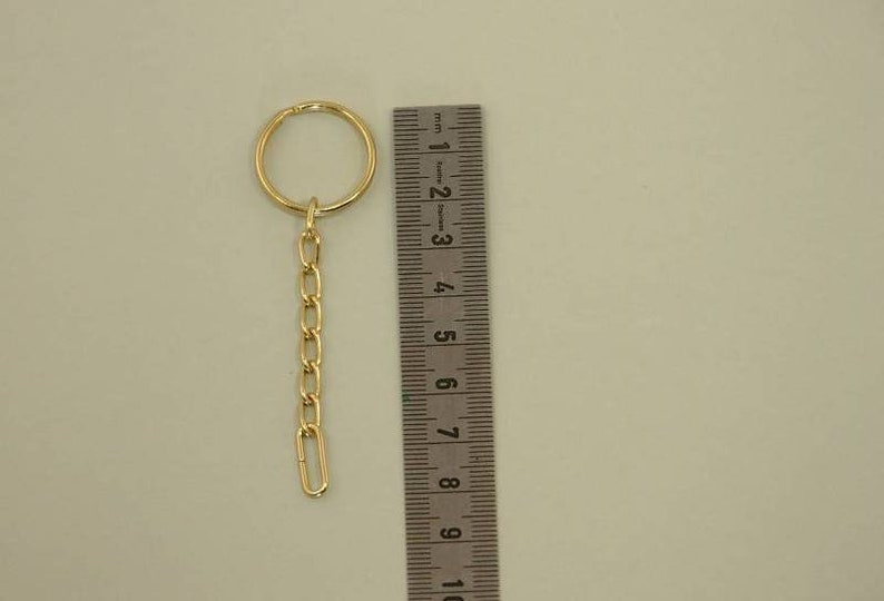 5 Schlüsselringe mit Kettchen vergoldet Bild 2