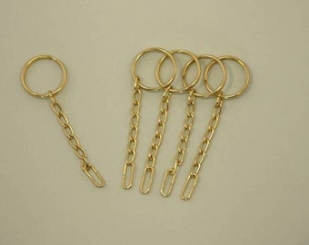5 Schlüsselringe mit Kettchen vergoldet