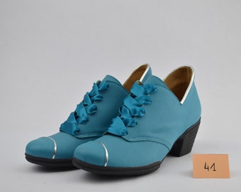 Derby en cuir turquoise et argent