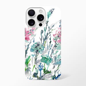 May include: A white phone case with a watercolor design of pink, blue, and green flowers and leaves.