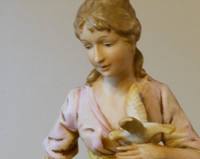 Old Bisque Porcelain Figurine of a Woman and a Boy Feeding a Bird