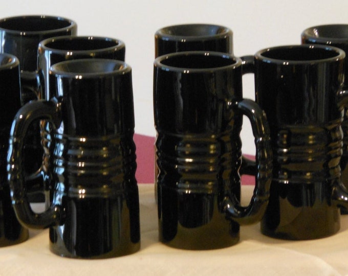 Eight Tall High Gloss Black Steins