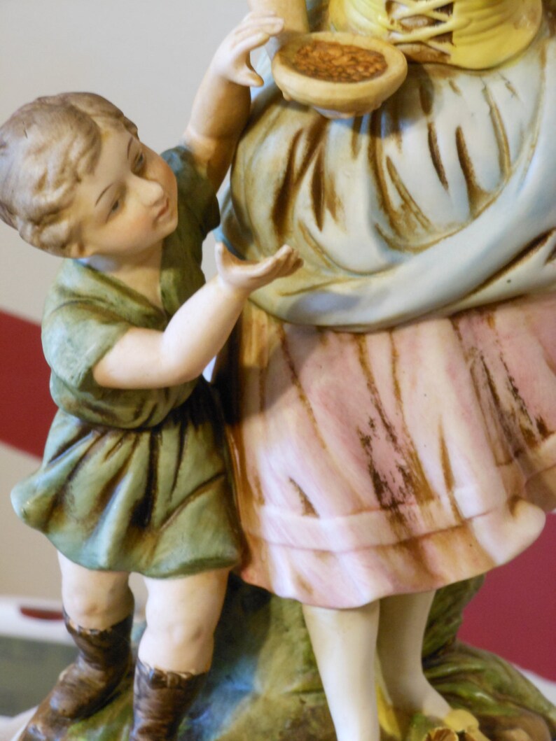 Old Bisque Porcelain Figurine of a Woman and a Boy Feeding a Etsy