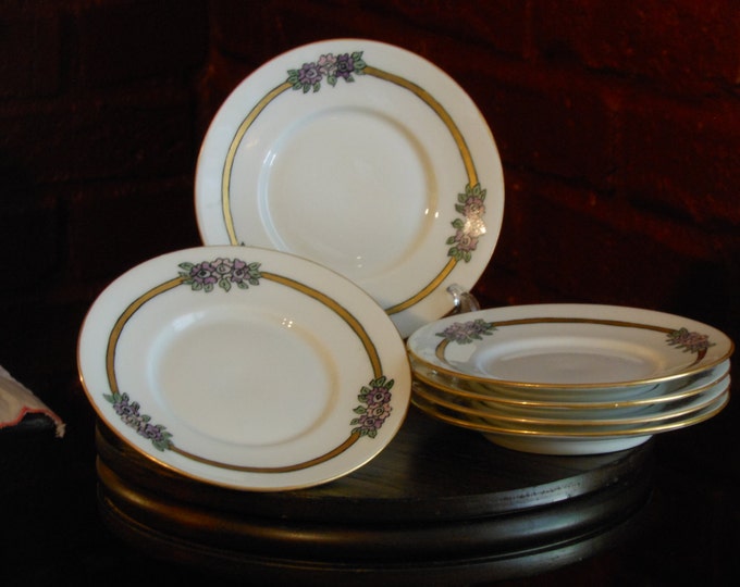 Six Antique KPM Saucers