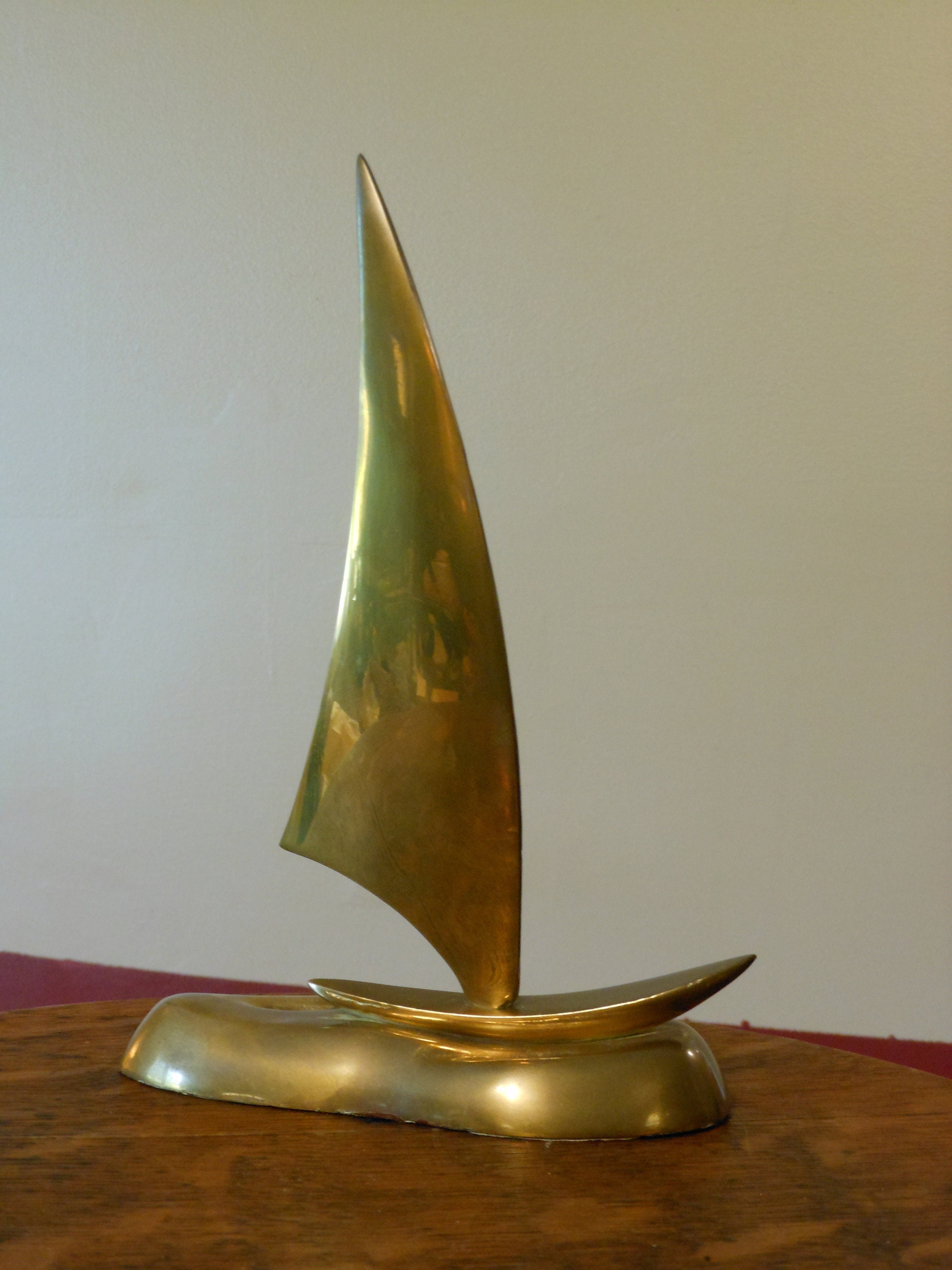 brass sailboat statues