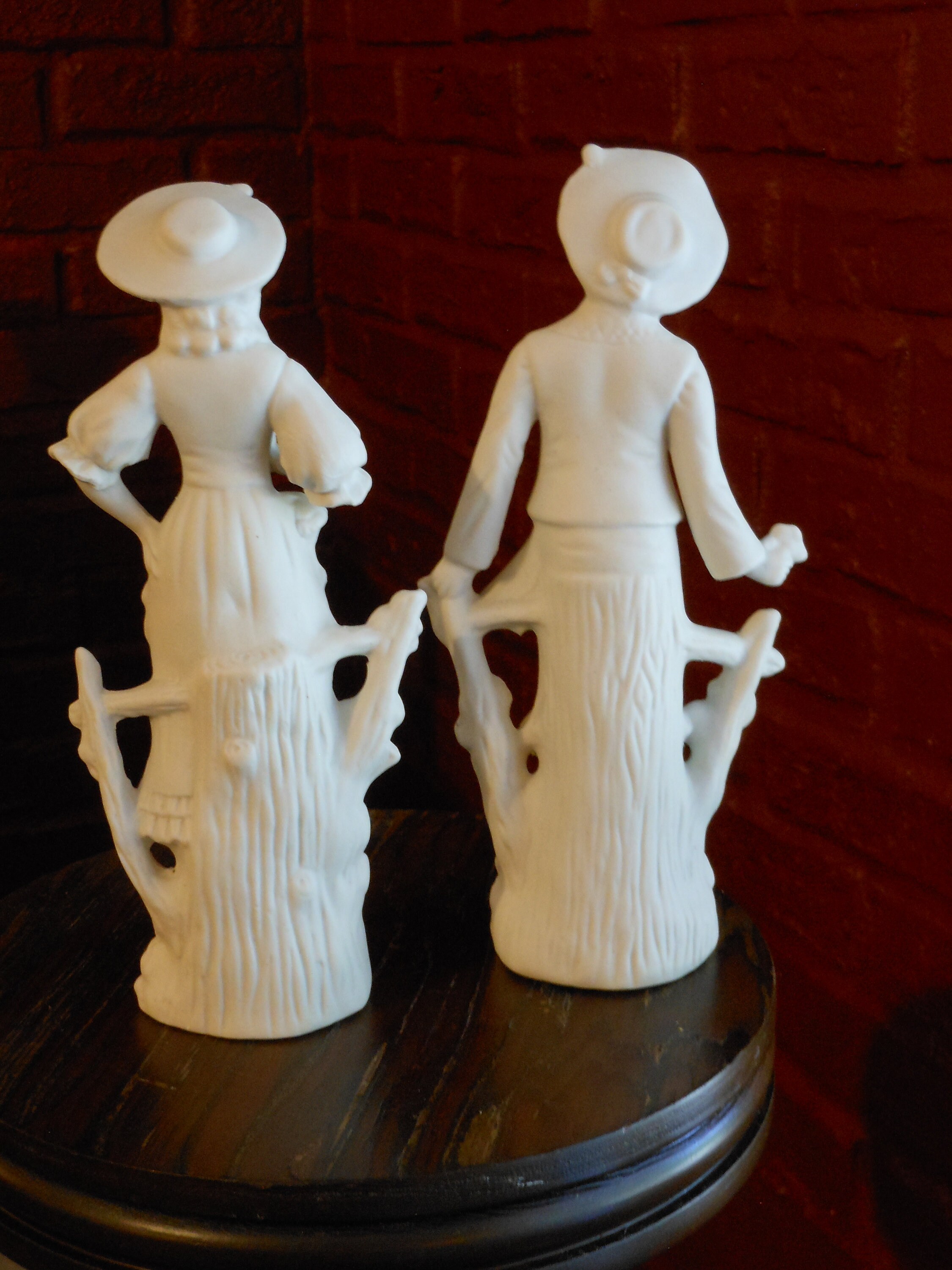 Two White Bisque Porcelain Mold Figurines (Boy & Girl)