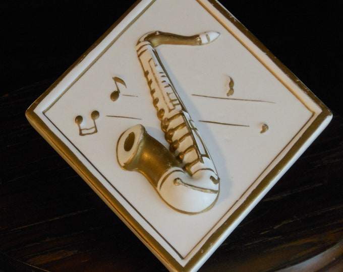 Diamond-Shaped Lefton Saxophone Embossed Wall Plaque