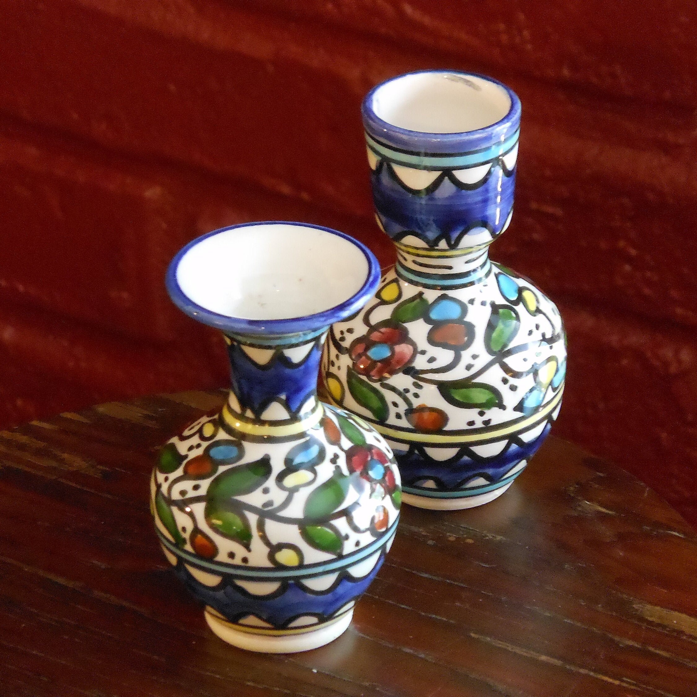A Pair of Hand Painted Ceramic Bud Vases