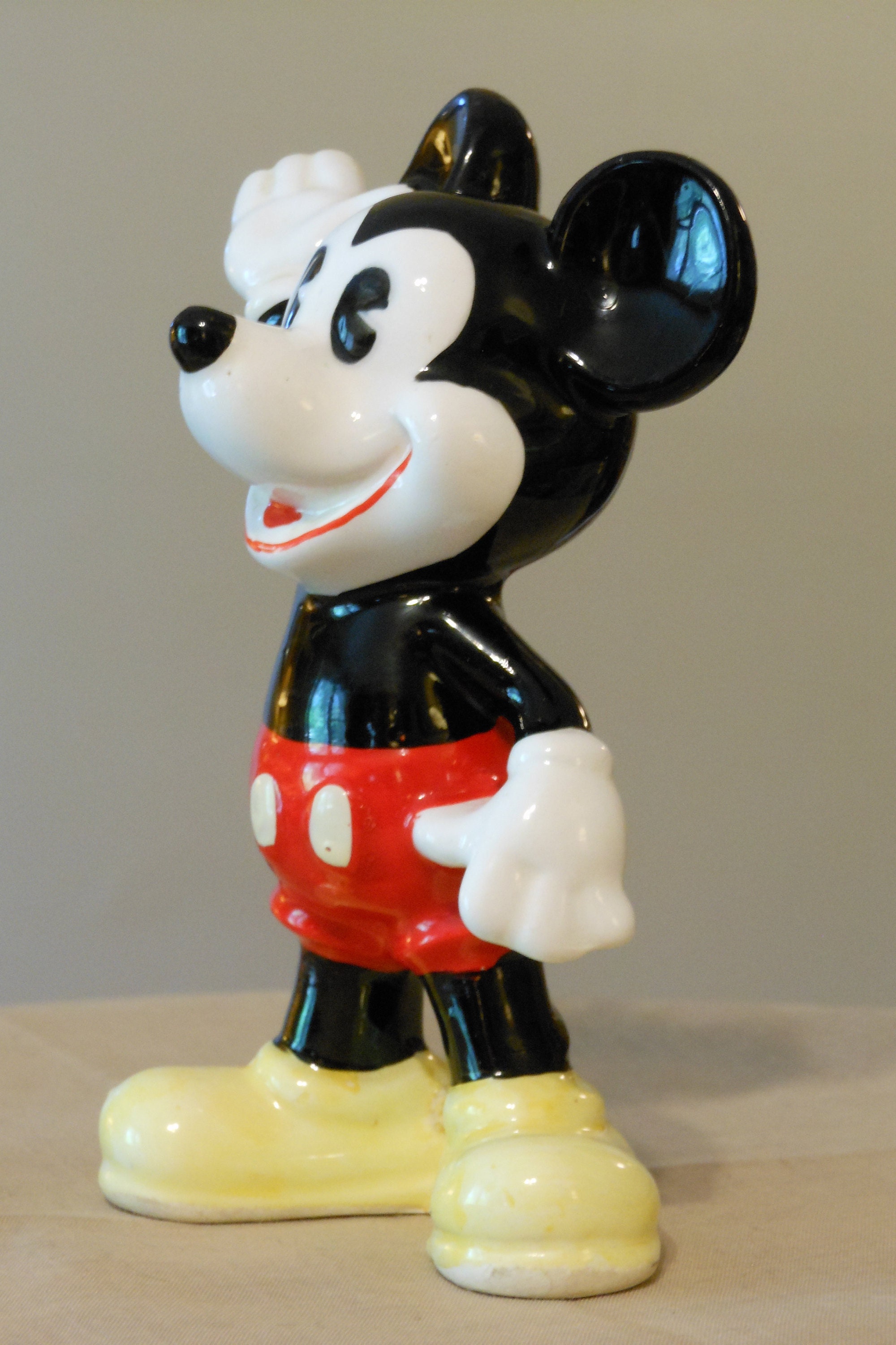 cement mickey mouse statue