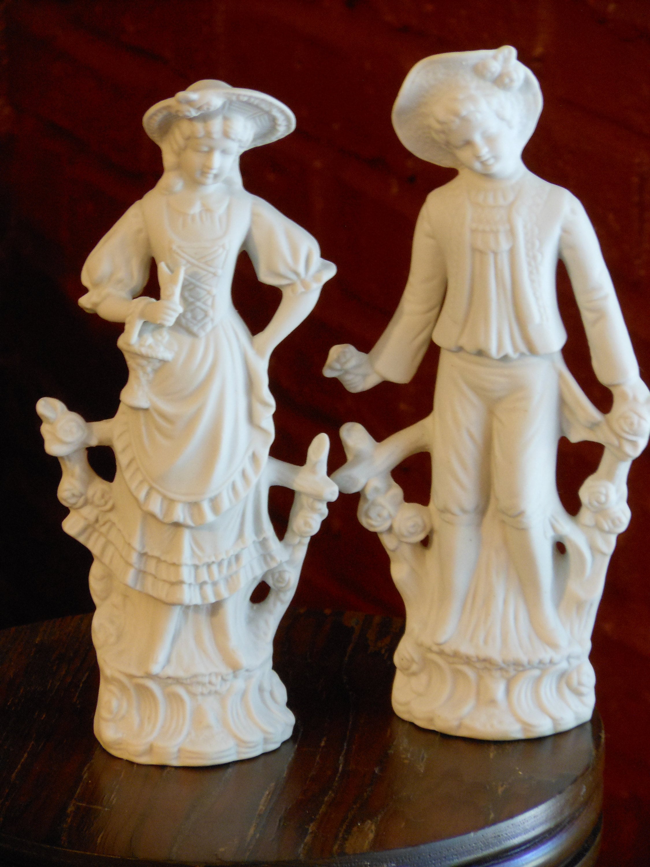 Two White Bisque Porcelain Mold Figurines (Boy & Girl)