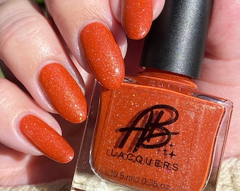 AB Polish Pumpkin Spice, Orange shimmer with scattered silver holographic microfine glitters nail polish