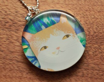 Jungle cat necklace made from recycled Starbucks gift cards, sterling silver and resin.