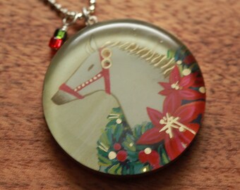 Holiday Horse necklace made from recycled Starbucks gift cards, sterling silver and resin.