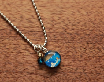 Tiny ornament necklace made from recycled Starbucks gift cards, sterling silver and resin.