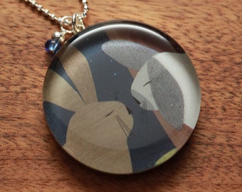 floppy bunny necklace made from recycled Starbucks gift cards, sterling silver and resin.