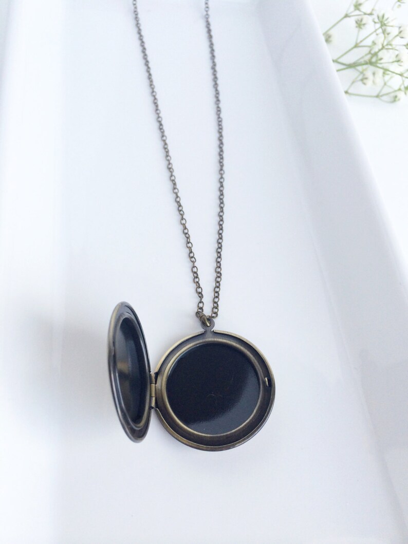 Andromeda \u2022 Round locket necklace