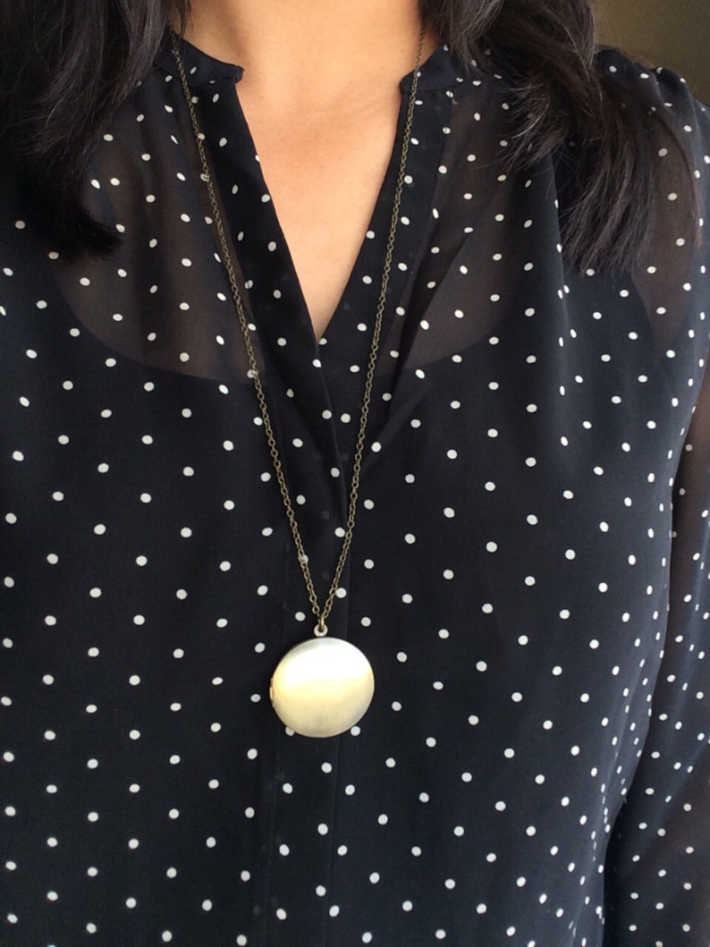 Andromeda \u2022 Round locket necklace