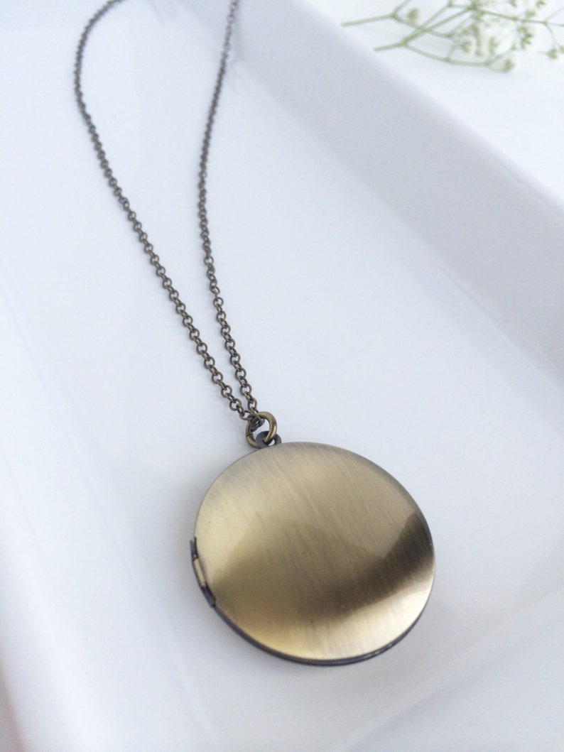 Andromeda \u2022 Round locket necklace